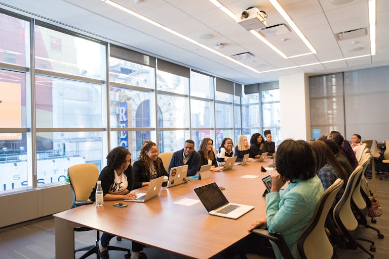 A diverse team of business professionals held the webinar on Contracting - Temporary Work - Secondment